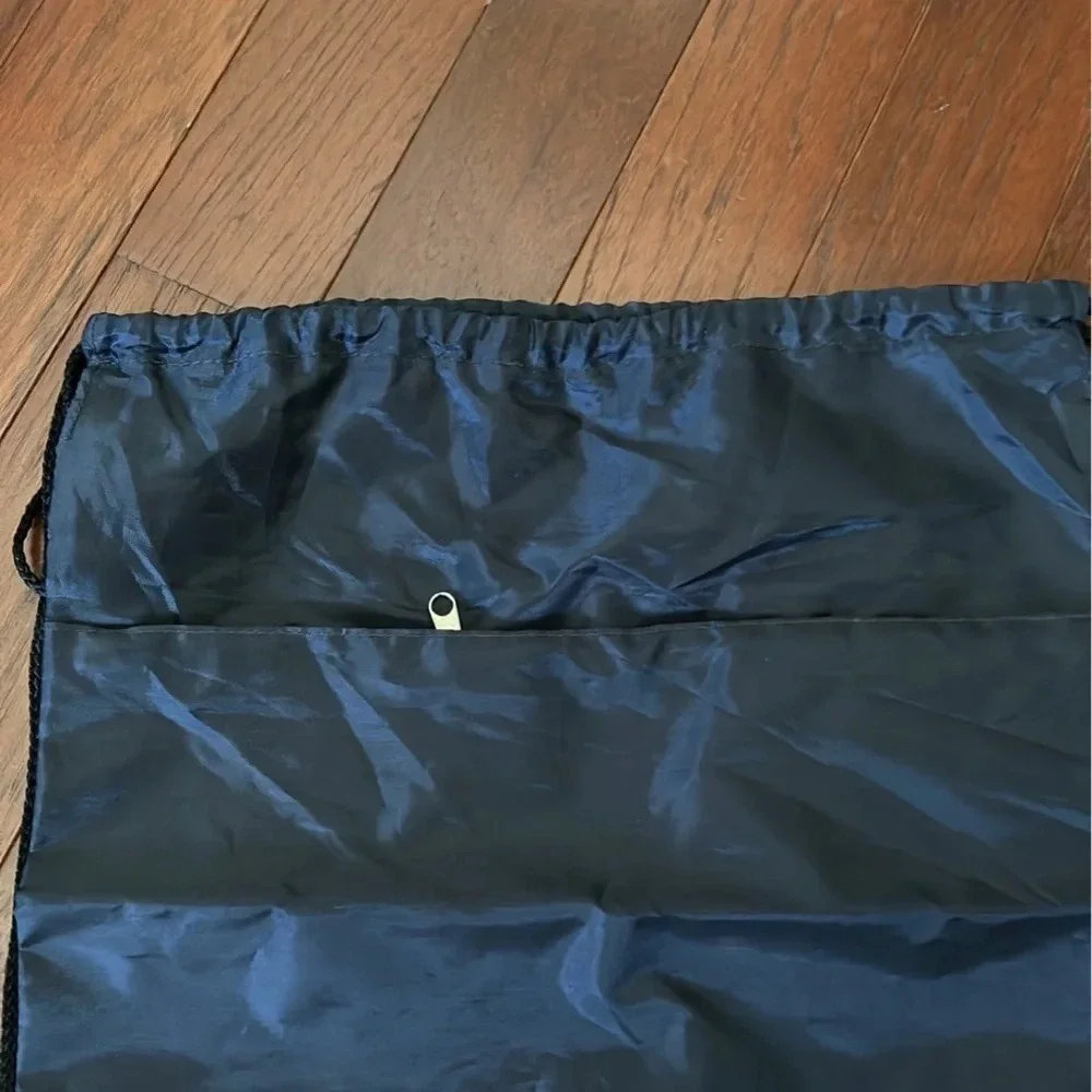 Carnival navy drawstring backpack with a zippered pocket new